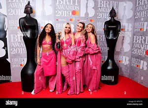 Leigh-Anne Pinnock, Jesy Nelson, Perrie Edwards and Jade Thirlwall of Little Mix with their Best British Video Brit Award in the press room at the Brit Awards 2019 at the O2 Arena, London Stock Photo - Alamy