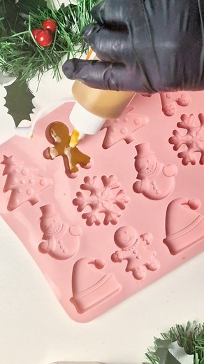 You can bake gingerbread in silicone moulds! As long as you keep your oven fairly low (about 160C), it's a great technique to stop your biscuits from spreading. Once the biscuits are cool, remove and fill the mould with melted chocolate or caramel drip, place the biscuit back in and set in fridge. You'll get a clean, delicious finish. | Bake Boss