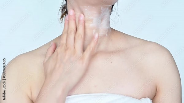 Woman applying body lotion on her body. Body lotion is moisturiser designed to use all over your body.