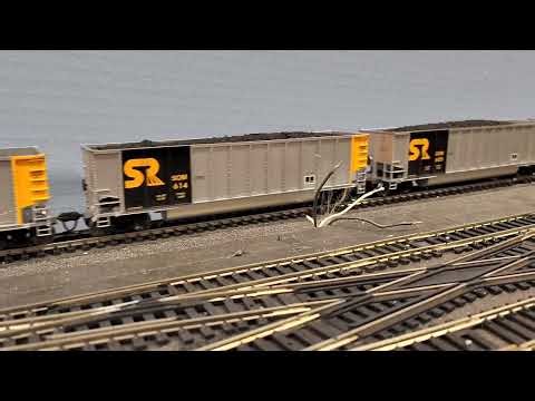 Norfolk and western J class and Y6b locomotives slug out a long coal drag
