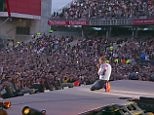 Emotional Chris Martin brought to his knees during 'Fix You' | Daily Mail Online