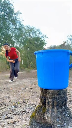 The girl stopped the water from falling down from the bucket #shorts