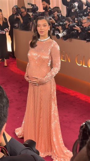 Fashion Bomb Daily on Instagram: "@haileesteinfeld debuted her baby bump at the @goldenglobes in a sequined pink @prada gown. 🎥 @clairesulmers #haileesteinfeld #haileesteinfeldfbd #haileesteinfeldstyle"