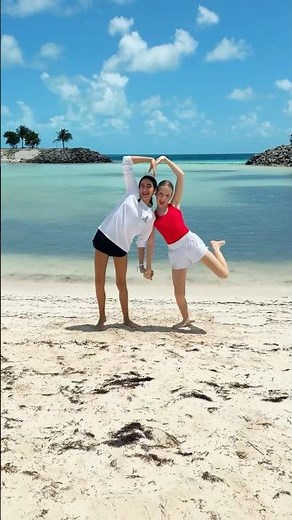 Nastya and Evelyn are doing the friends dance.