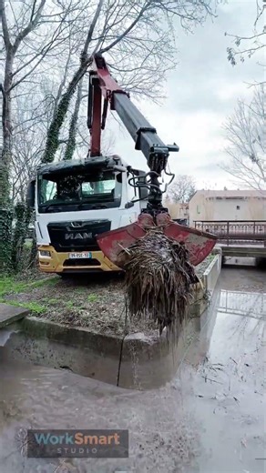 Drain Cleaning Operation by Heavy Equipment Operator : Lifting Removing Debris Maintenance Process