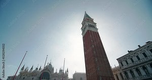 Campanile of St. Mark's Cathedral in Venice, Italy. Beautiful tower in the old architecture of the cityscape of the tourist city of Europe. High quality 4k footage