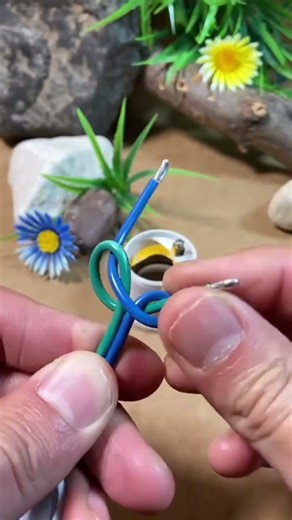 Simple knot technique to keep lamp socket wires safe and tight #electricalwork #wiring #DIYprojects