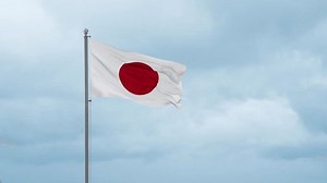clip-1108903381-japan-flag-waving-wind-cloudy-blue-sky