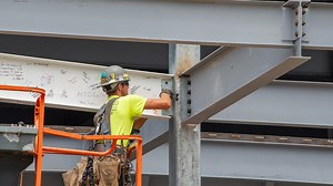 Hagerstown marks halfway point in field house construction with 'topping-off' ceremony.