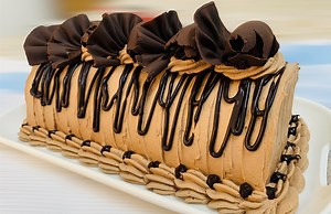 Chocolate cake roll recipe A nod to the classic childhood favorite, this chocolate cake roll combines light chocolate sponge cake with chocolate icing . Rich and totally irresistible, this dessert is for chocolate lovers everywhere. Follow this carefully explained step-by-step recipe and video tutorial for success. Recipe For the sponge Eggs 3pcs ( large) Cake flour 80g (3/4 cup) Vegetable oil 30ml( 2tbsp) White sugar 90g (1/2cup) Baking powder 1/2 tsp Salt 1/4tsp Water 30ml ( 2tbsp) Cocoa powde