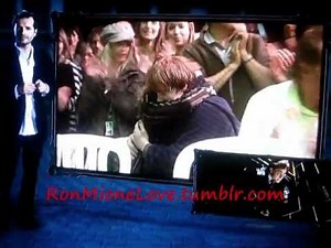 Rupert and Emma hug during last day of Deathly Hallows filming