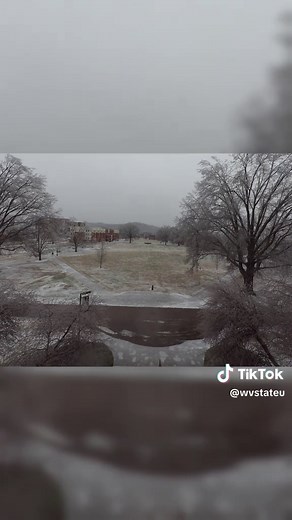 Winter under pressure at WVSU. ❄️ Snow piling up, ice pulling trees toward the ground, and a campus that somehow looks even more beautiful. Timelapse or not, this storm was a whole mood. #WestVirginia #CampusLife #SnowDay #WinterStorm