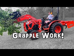 Kubota LX2610 with Grapple, small tractor does BIG work!