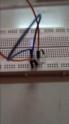 basic breadboard circuit using resistor,led, jumper wires. complete circuit implementation