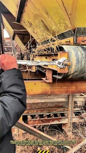 Using a Wrench Extender for Extra Leverage on Heavy Machinery