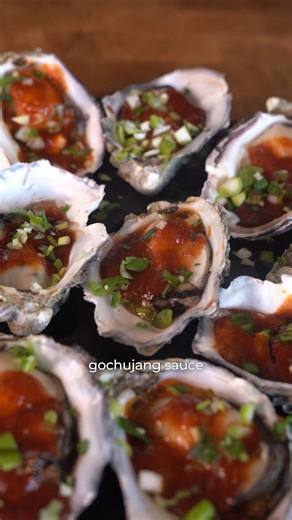 Christmas Gochujang Grilled Oysters | Spicy Korean Barbecue Oyster Recipe Full Recipe Here: Ingredients 24 fresh oysters shucked 2 tbsp gochujang Korean chilli paste 1 tbsp soy sauce 1 tsp sesame oil 2 garlic cloves finely minced 1 tsp fresh ginger grated 2 green onions finely sliced Salt to taste Cracked black pepper to taste Method Prep Time: 10 minutes Cook Time: 5 to 6 minutes Serves: 4 1. Prepare the Barbecue Preheat your barbecue for direct cooking using quality charcoal. You want a steady