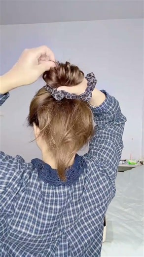 Master a Simple Bun Hairstyle in 3 Steps