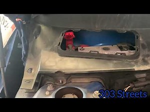 How do you replace the battery in the Mini Countryman?