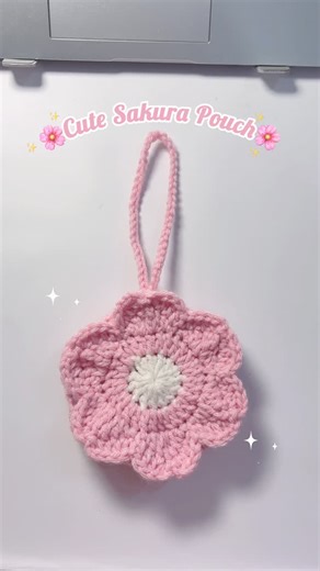 Lily ♡ | Crochet on Instagram: "💌 I looove sakura themed products and it’s my dream to see cherry blossoms in person someday🌸💗 Made this in the middle of the night. It turned out so cute💕 DM to order🌸 . . . [pink sakura crochet pouch, cherry blossom crochet pouch, handmade crochet pouch, aesthetic crochet accessories, pastel pink crochet, cute crochet pouch ideas, crochet sakura pattern, small crochet bag, handmade gift crochet] 🏷️ #crochetpouch #sakura #handmadepouch #crochetreels #aesthe