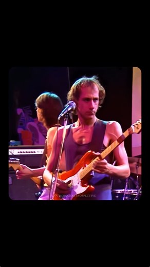 TheRockRetrospective on Instagram: "Dire Straits – “Sultans of Swing” (Live, 1979). When Mark Knopfler wrote “Sultans of Swing,” it started as a rough acoustic demo, but the moment he plugged in his Strat, the song came alive. The clean fingerstyle lines, the flowing melodic phrasing, and that effortless storytelling guitar work turned a small pub-band vignette into one of rock’s most defining guitar songs. Live, Knopfler stretches the solos with even more precision and swing, proving why the tr