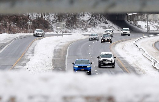 Blizzard conditions snarl holiday travel as tornadoes leave damage in the Midwest