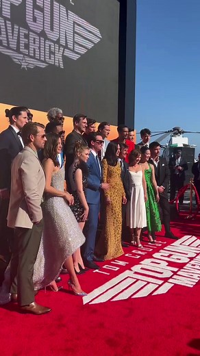 “Go Navy!” - Tom Cruise, Jon Hamm, Miles Teller and the cast of ‘Top Gun: Maverick’ posed together on board the USS Midway for the film’s premiere | The Hollywood Reporter