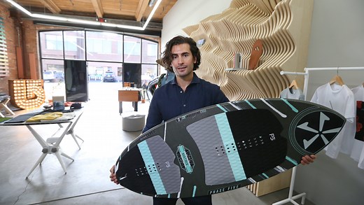 Surf's up: New Neon Wave in Neighborhood of the Arts promotes Lake Ontario surfing