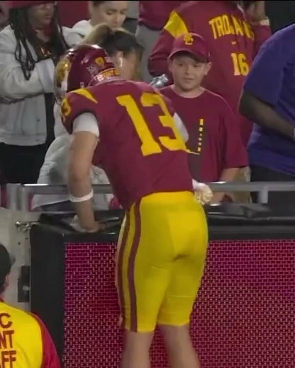 Caleb Williams crying in mothers arms after loss to washington