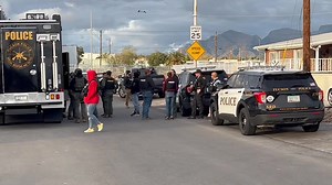 UPDATE; the suspect was arrested - https://fb.watch/pOD23nGZJI/ --------------------------------------------------- LIVE, LOCAL, LATE BREAKING I am on the scene of a SWAT situation. TPD has a home surrounded and are instructing a suspect to come out of a house near Grant and Oracle. We are working to get more information. | Dan Marries - KOLD News 13