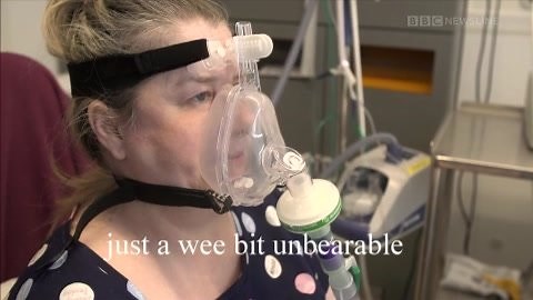 Ward 3A at the Ulster Hospital is a place where no patient wants to go. But many have nothing but praise for the help and care they've received there. 3A is a respiratory Covid 19 ward where many of the patients have CPAP treatment. A special mask links the patient to oxygen. It's usually the last stop before Intensive Care. Our Health Correspondent Marie-Louise Connolly, cameraman John Morrisey and producer Leslie Anne McKeown were given exclusive access to the ward to hear from staff and patie