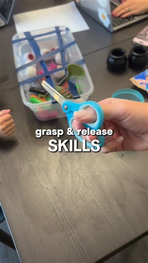 Grasp & Release skills by Ms. Taylor ✂️✨ Grasp and release skills are an essential foundation for learning to use scissors. When children open and close their hands to grasp and release objects, they strengthen the small muscles in their fingers and hands that control scissor movement. These skills help develop the coordination, strength, and rhythm needed to open and close the scissors smoothly while cutting along a line. Practicing grasp and release also supports hand-eye coordination and bila