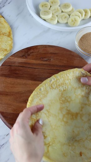 Crepe Wrap Hack! If you loved the tortilla hack, this sweet reinvention using crepes is oh so good. Dessert guru Sheri Wilson combined our new Salted Caramel Dessert Snack Spread with sliced bananas, cinnamon and cream cheese. Then, she used the spread to caramelize the crepes on the outside - yum! What crepe combo would you make? | Challenge Butter