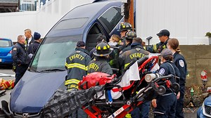 Dramatic Rescue: Firefighters Remove Driver From Car That Crashed Over Wall in Everett