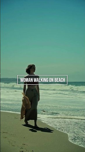 Woman Walking on Beach