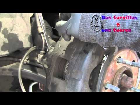 How to bleed a car's brakes with the help of another person to remove the air from the brake system
