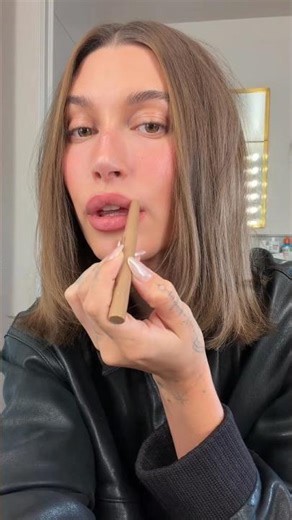 Hailey Bieber Creates Her Signature Lips With Rhode Peptide Lip Shape & Lip Treatment #shorts