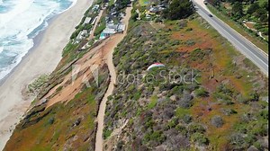 paragliding on Cachagua beach, on the side of a road, region of Valparaiso, country of Chile