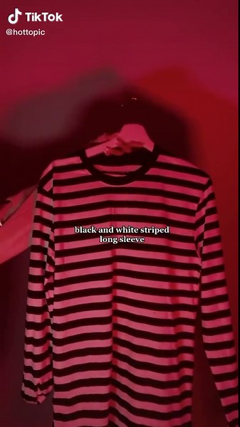 how to style band tees in the winter ❄️ #hottopic #bandtees #arianagrande #styling