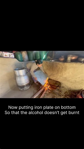 Brewing alcohol in village