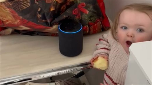 Adorable toddler in total amazement after Alexa gets her request to play Baby Shark
