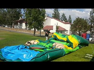 Jumper life: How to roll up a huge inflatable 18' dual Lane water slide bouncer all by yourself