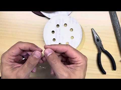 Mending broken fairy light wire.