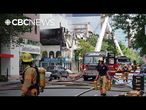 Building age, heat make extinguishing downtown Montreal fire more challenging