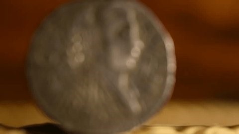 clip-4047419073-ancient-indian-coin-close