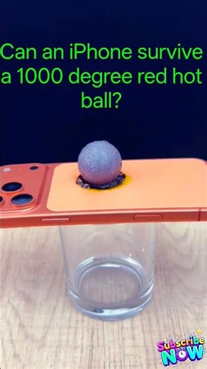 1000 degree red hot ball burned a hole through iPhone #shorts