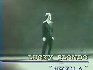 Bonjour les Agetendriens, Voici un artiste que nous aimerions accueillir sur la tournée car il symbolise aussi cette époque des yéyés que nous aimons, Monsieur Lucky Blondo. Et en plus, il chante Sheila qui est notre invité d'honneur du 10ème Anniversaire. Vous allez faire des courses aujourd'hui ? Pensez à réserver vos meilleures places pendant que c'est encore possible à Auchan, Carrefour, Leclerc, Super U, etc...ou sur internet, ça marche aussi. Vivement Age Tendre 10ème Anniversaire !!! | Ag
