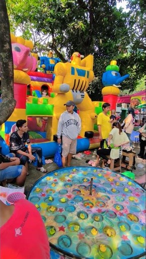 colorful robot balloon castle and spinning duck game