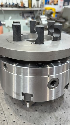 Adam Booth on Instagram: "Let’s put the TMX 6 jaw chuck on the Precision Matthews lathe. This chuck was originally acquired for the ML16 CNC lathe but wasn’t used much. Someone give me this NOS D1-6 backing plate so I’m going to machine it to make it work with the set-true style on the 6 jaw. First we’ll get the adaptor turned to fit, then we’ll machine the hike patterns and establish flats for the setting screws to push against. #abom79 #machineshop #lathework #manualmachining #precisionmatthew