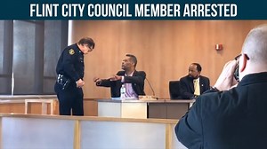 Flint Councilman Eric Mays was escorted out in handcuffs from last night's meeting. Leading up to his arrest Mays incited an hour of outbursts and arguments with fellow council members. They voted to remove Mays from the meeting but he refused, telling a police officer he'd only leave unless he was arrested. | MLive.com