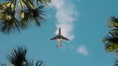 Slow motion footage of an airplane flying across the sky on a sunny...